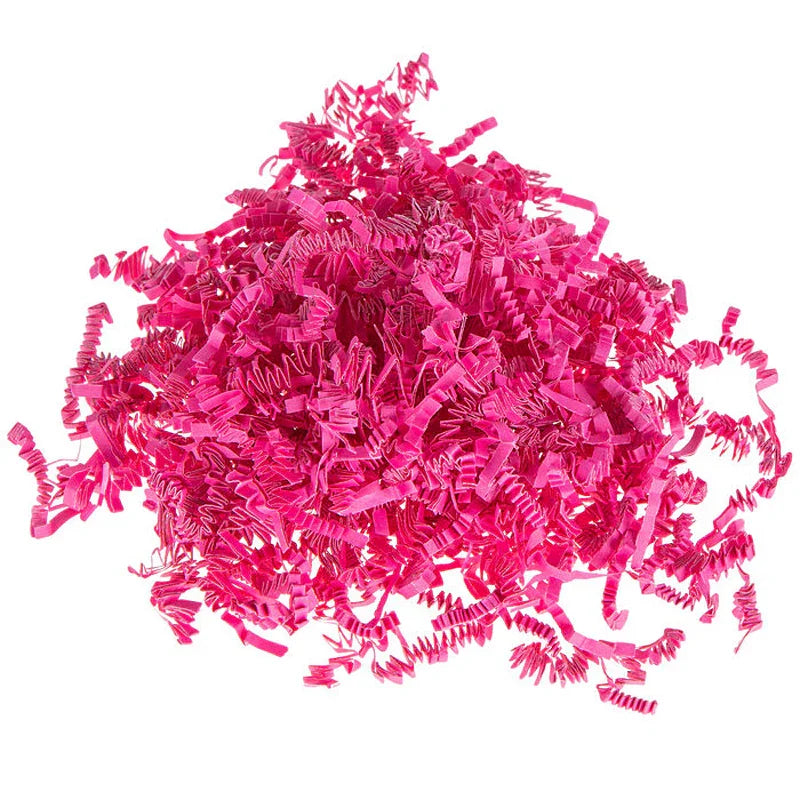 Bright pink crinkle paper shred for eco-friendly packaging filler by Greenii Inc.