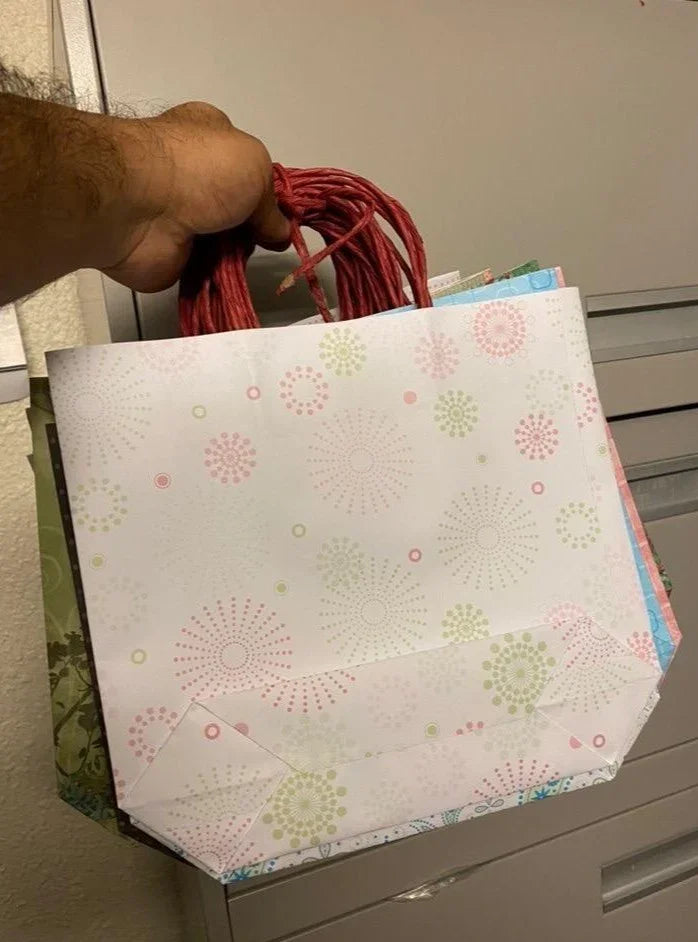 Gift bags - Small with pastel circular patterns and red twisted handles, handcrafted from upcycled scrapbook paper waste