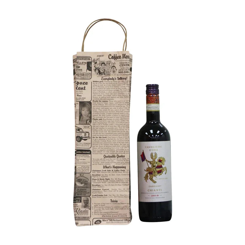 Eco-friendly newspaper print wine bag with handle beside bottle of Cavaliere d’Oro Chianti