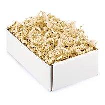 Crinkle paper shreds - French Vanilla with lightly crimped thin strips filling a white box for decorative packaging use
