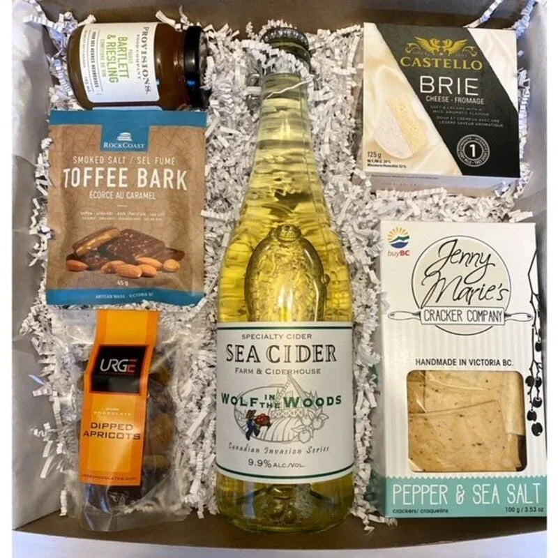 Gift box with Sea Cider, Brie cheese, smoked toffee bark, apricots, crackers, and jam