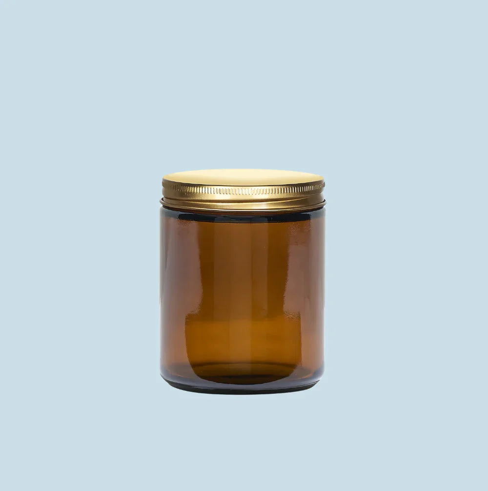 Empty Candle Jars | Wholesale Glass Containers | Eco Friendly Candle Packaging with amber glass and gold metal lid in minimal style